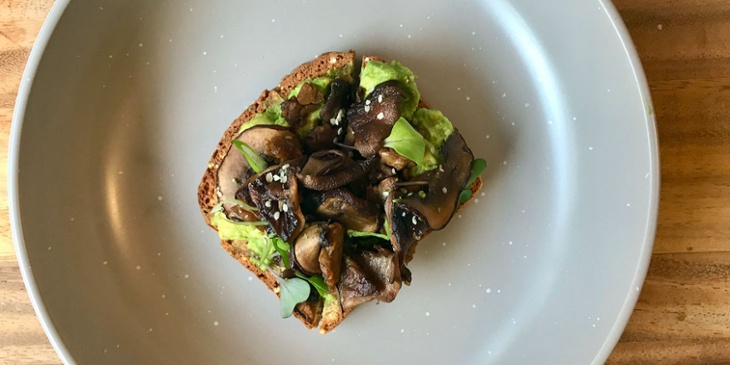 Avocado toast served on a deep dish